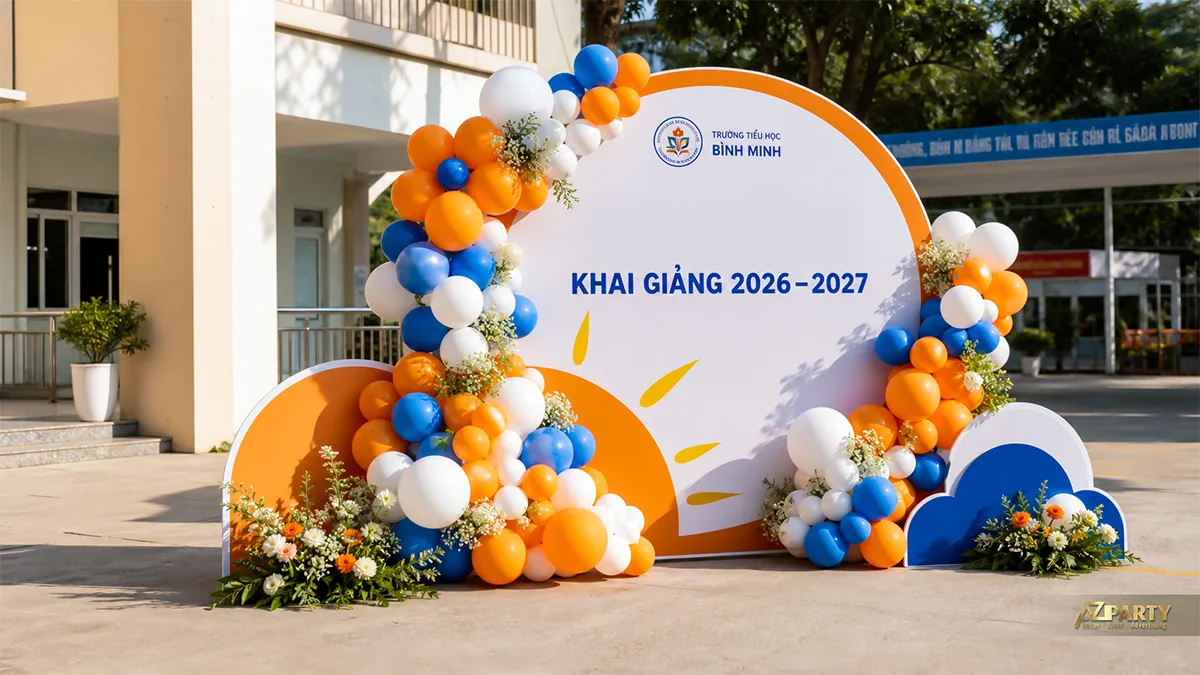 Backdrop tròn khai giảng Bình Minh với mặt trời cam, bóng xanh trắng và hoa hai bên