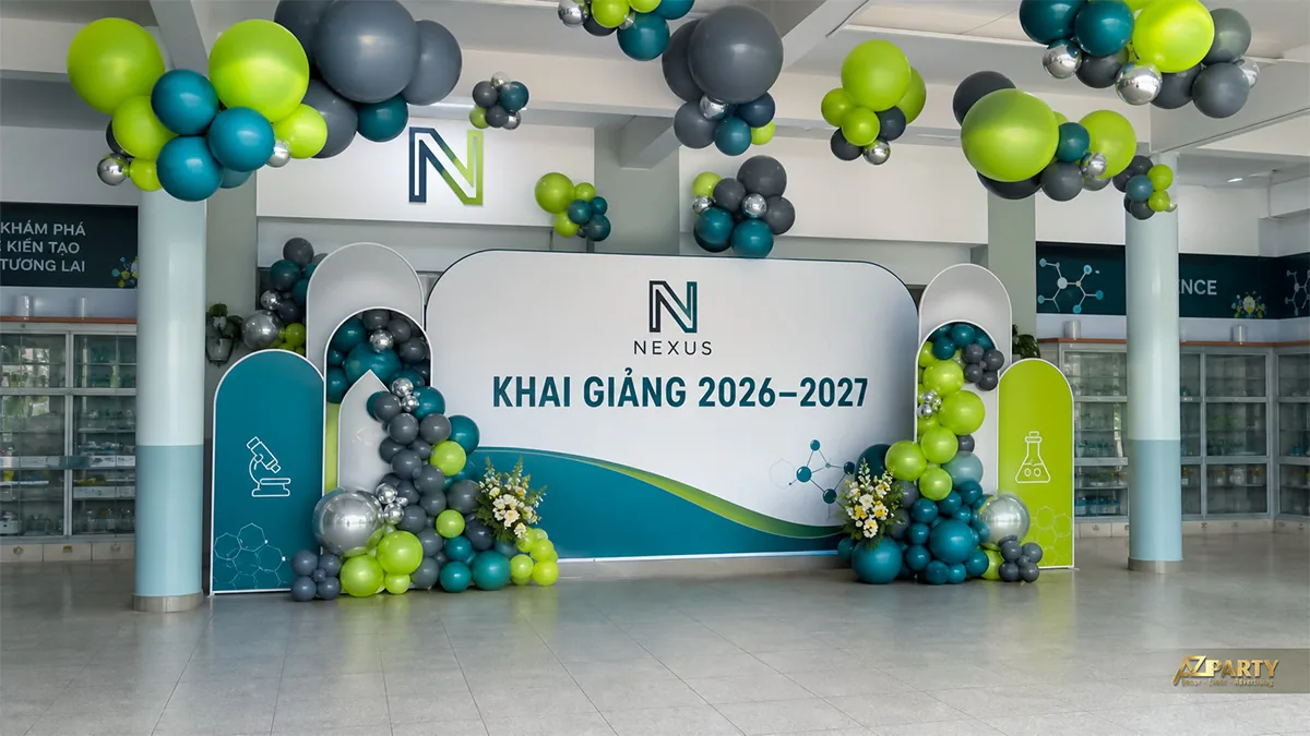 Backdrop khai giảng Nexus chủ đề khoa học với bóng xanh lá, xám và bạc