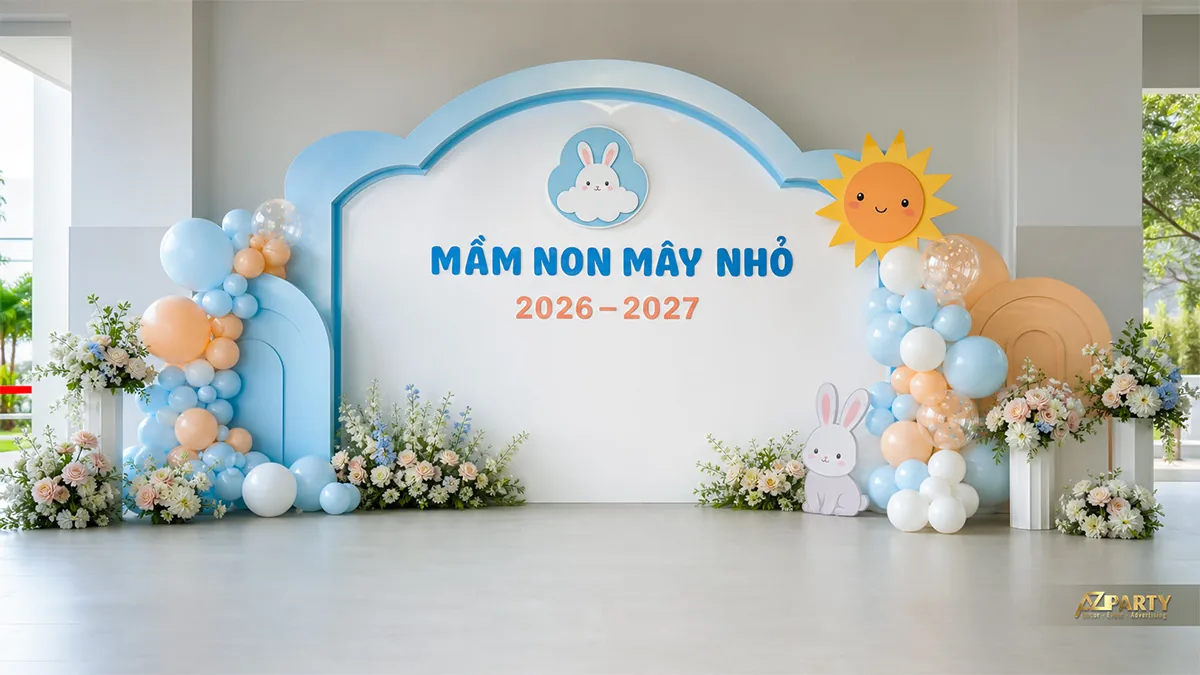 Backdrop khai giảng mầm non Mây Nhỏ màu xanh cam với thỏ trắng, mặt trời và hoa