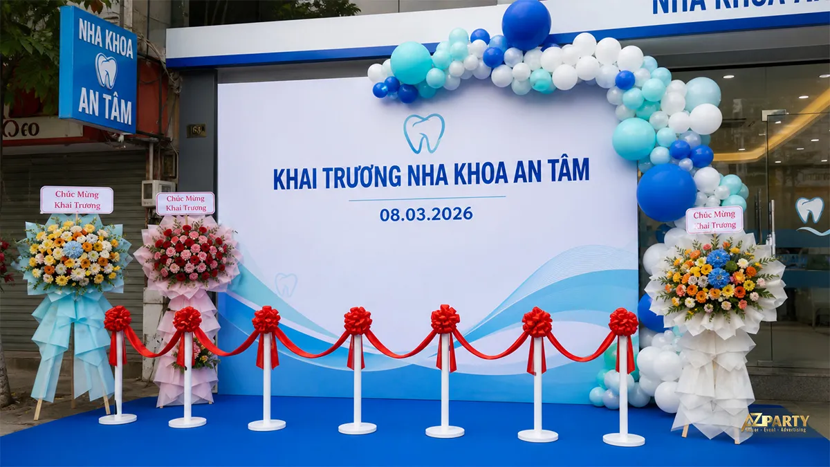 Phông khai trương Nha khoa An Tâm màu xanh dương cùng bục cắt băng