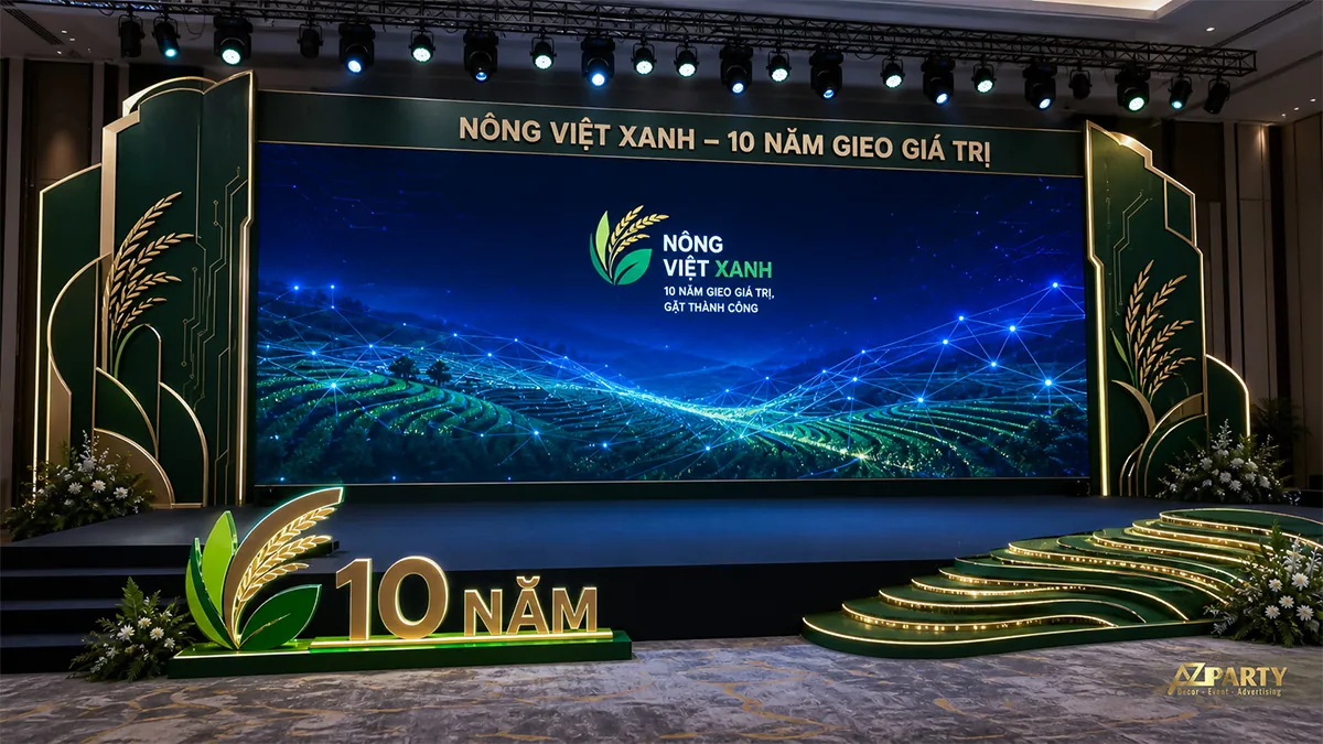 Backdrop 10 năm Nông Việt Xanh với ruộng bậc thang và đường sáng công nghệ