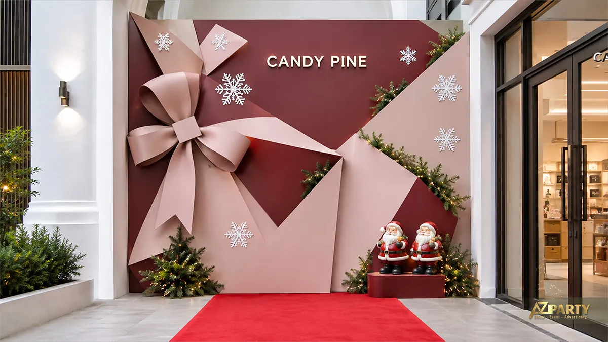 Backdrop Noel màu hồng mận với nơ ruy băng khổ lớn, bông tuyết và mô hình ông già Noel