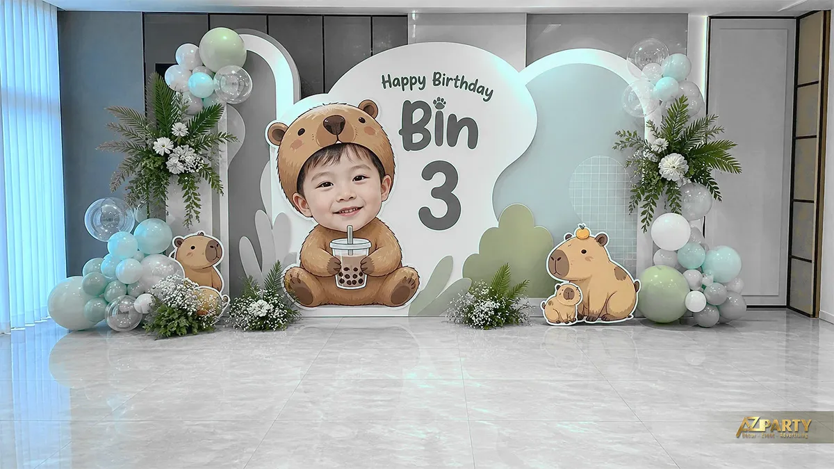 Không gian sinh nhật Capybara xanh lá với cây cỏ và bóng pastel