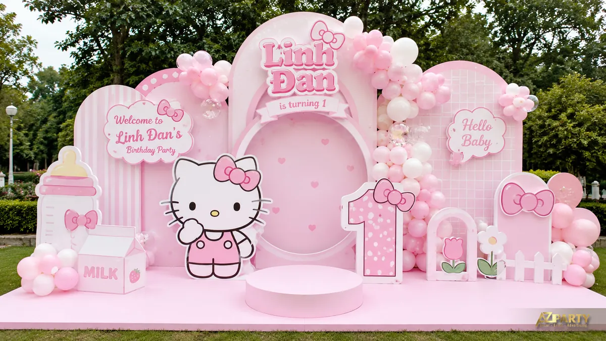 Backdrop sinh nhật Hello Kitty tone hồng baby cho bé Linh Đan 1 tuổi với bình sữa, hộp sữa và bóng bay