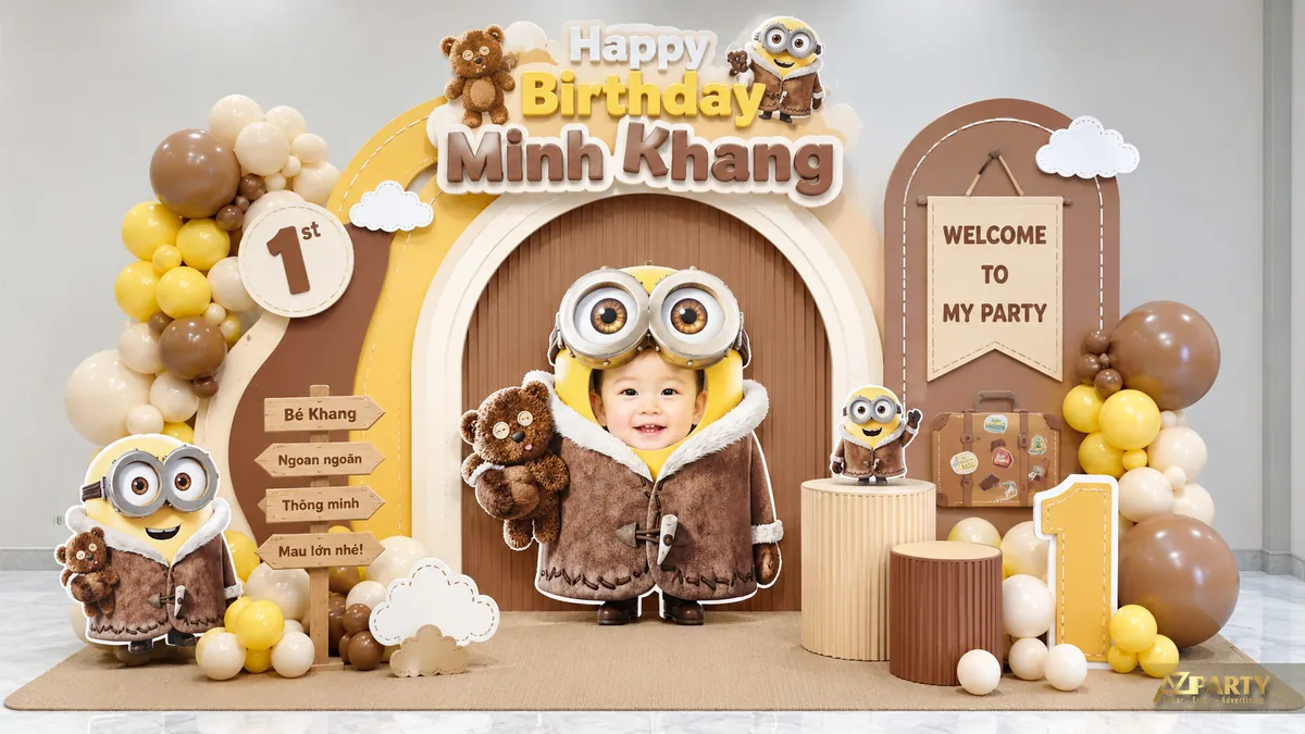 Backdrop sinh nhật Minions màu nâu teddy với ảnh bé trong khung tròn và bàn trụ kem nâu