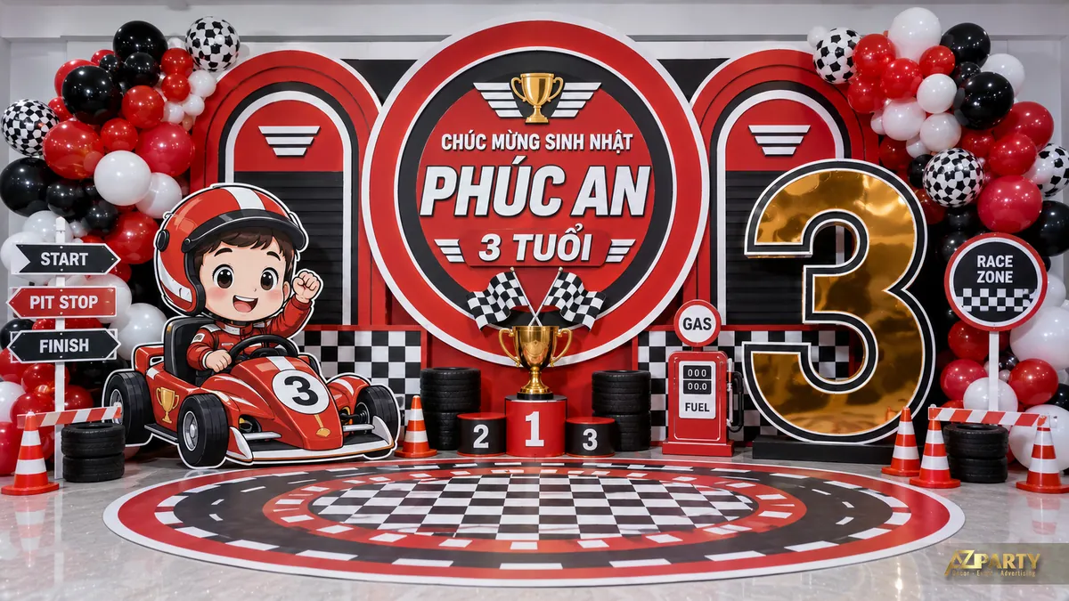 Phông sinh nhật xe đua go-kart đỏ đen cho bé Phúc An 3 tuổi với trạm xăng và cờ caro