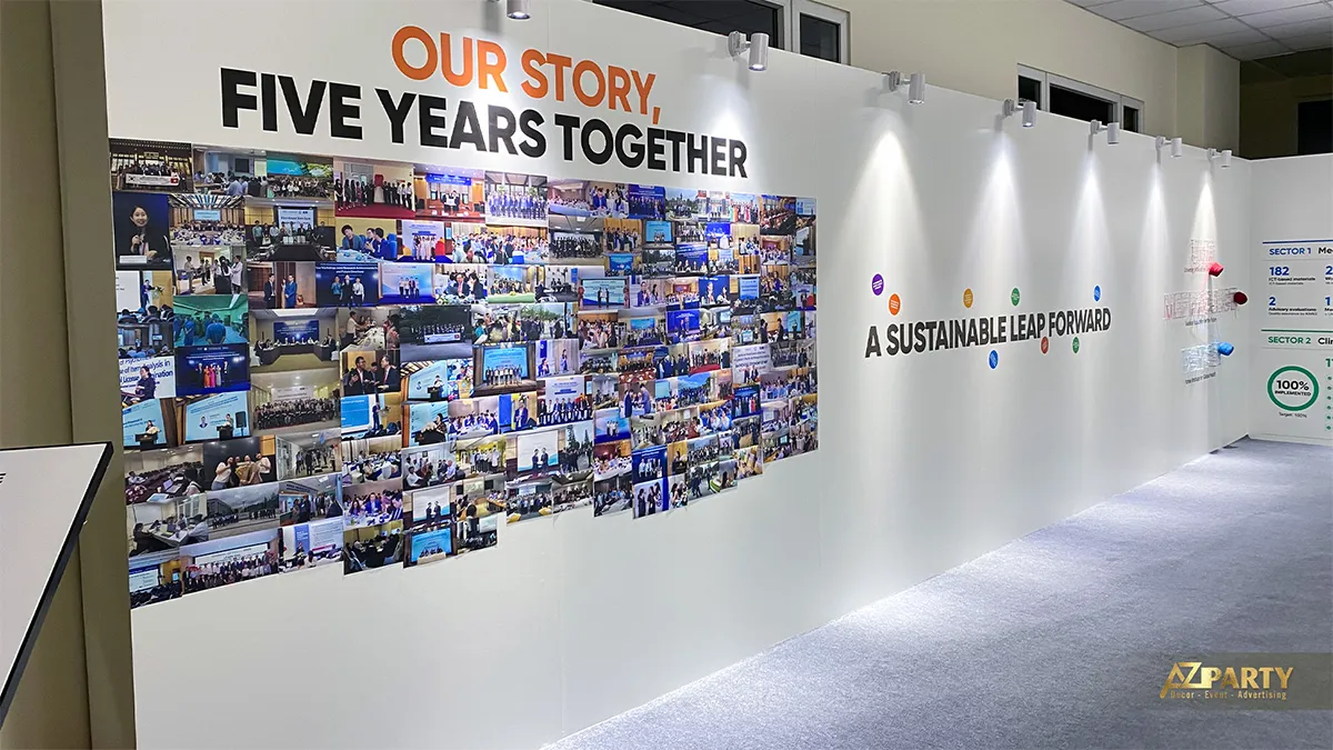 Vách Our Story Five Years Together với ảnh hoạt động và thông điệp A Sustainable Leap Forward