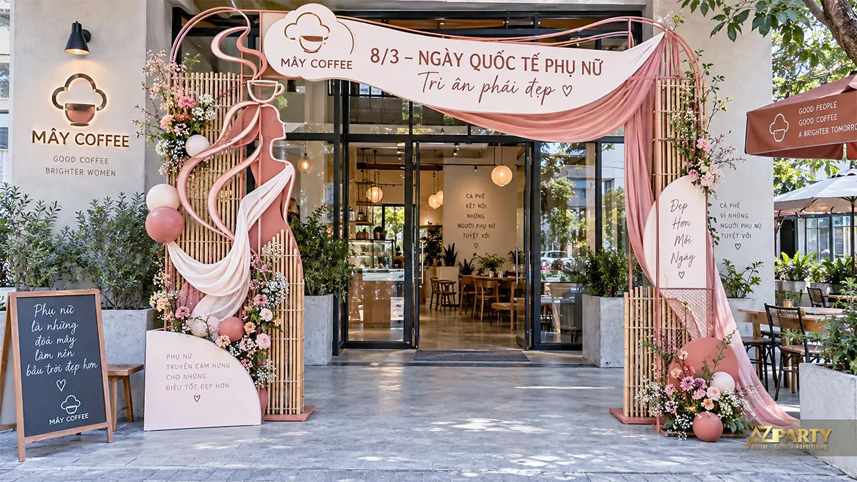 Cổng quán cà phê hồng kem với hình tách cà phê và gương mặt phụ nữ
