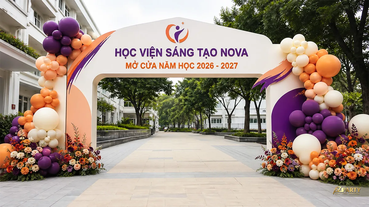Cổng chào khai giảng Học viện Sáng tạo Nova màu tím cam, kết hợp bóng và hoa hai chân cổng
