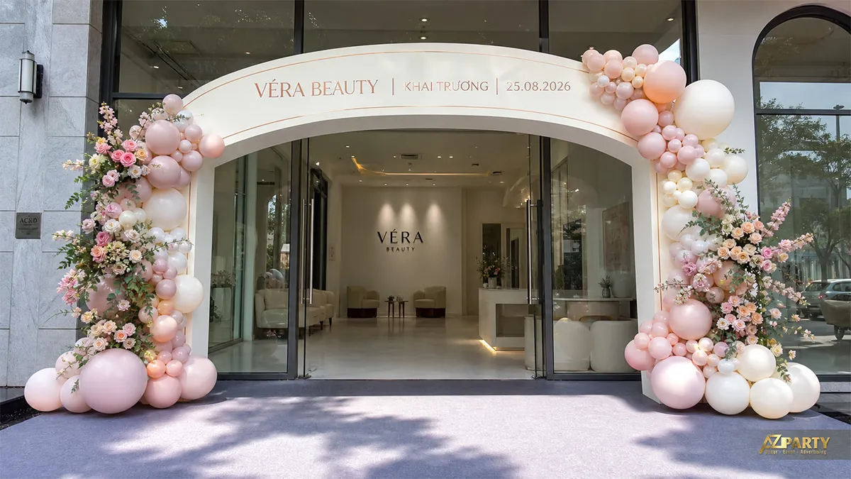 Cổng vòm khai trương màu hồng pastel và trắng