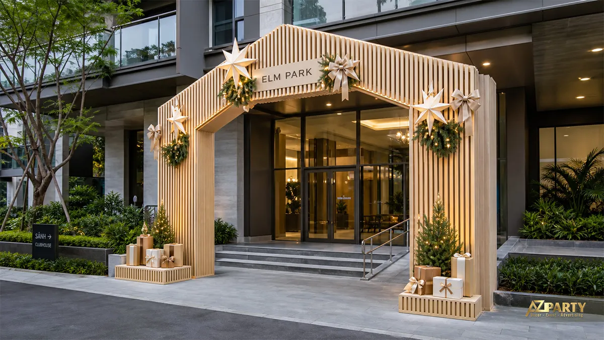 Cổng Noel khung gỗ nan dọc, ngôi sao phát sáng và quà tặng trước sảnh Elm Park