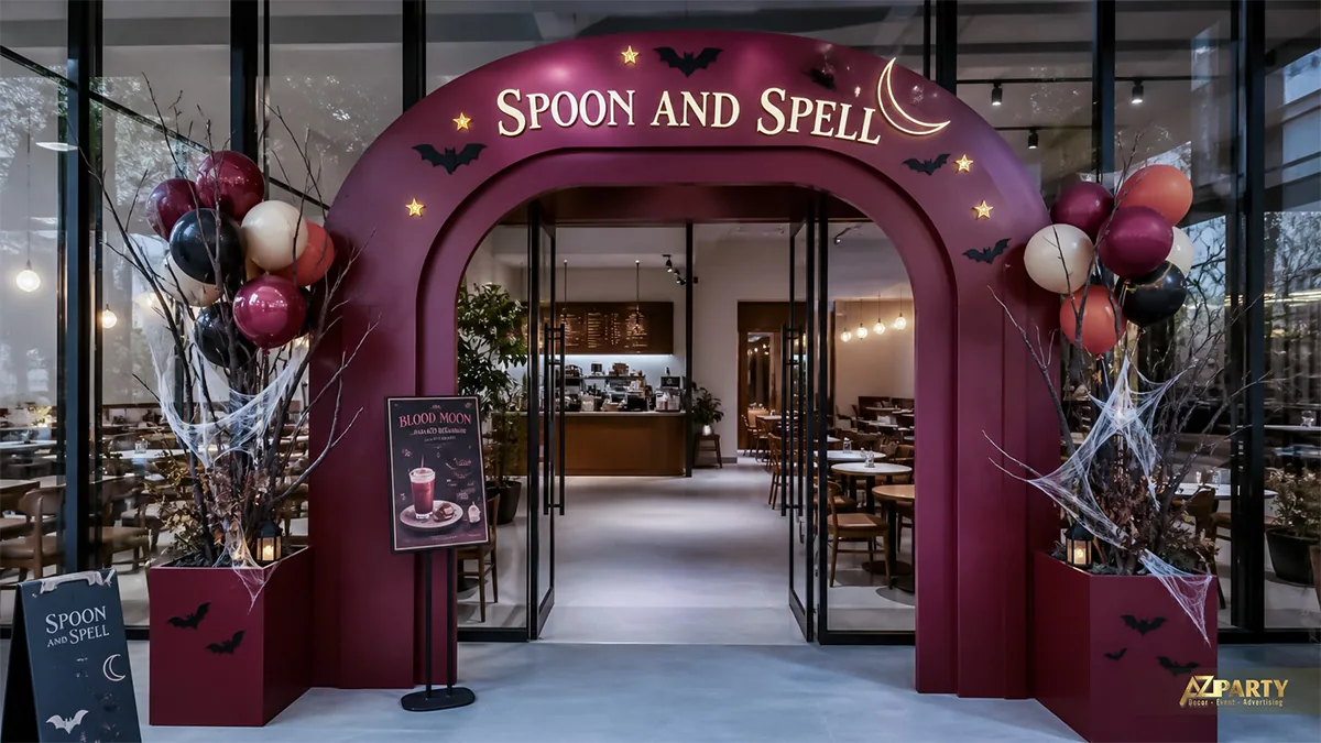 Cổng vòm tím Spoon and Spell với bóng rượu vang, dơi, mạng nhện và bảng Blood Moon