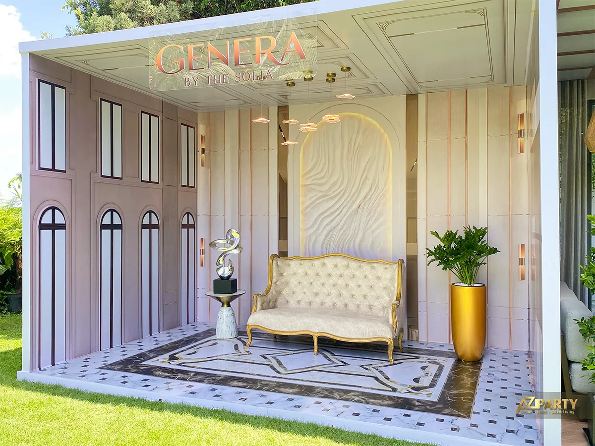 Góc nhìn chéo khu tiếp khách Genera với sofa kem và mảng tường có đèn hắt