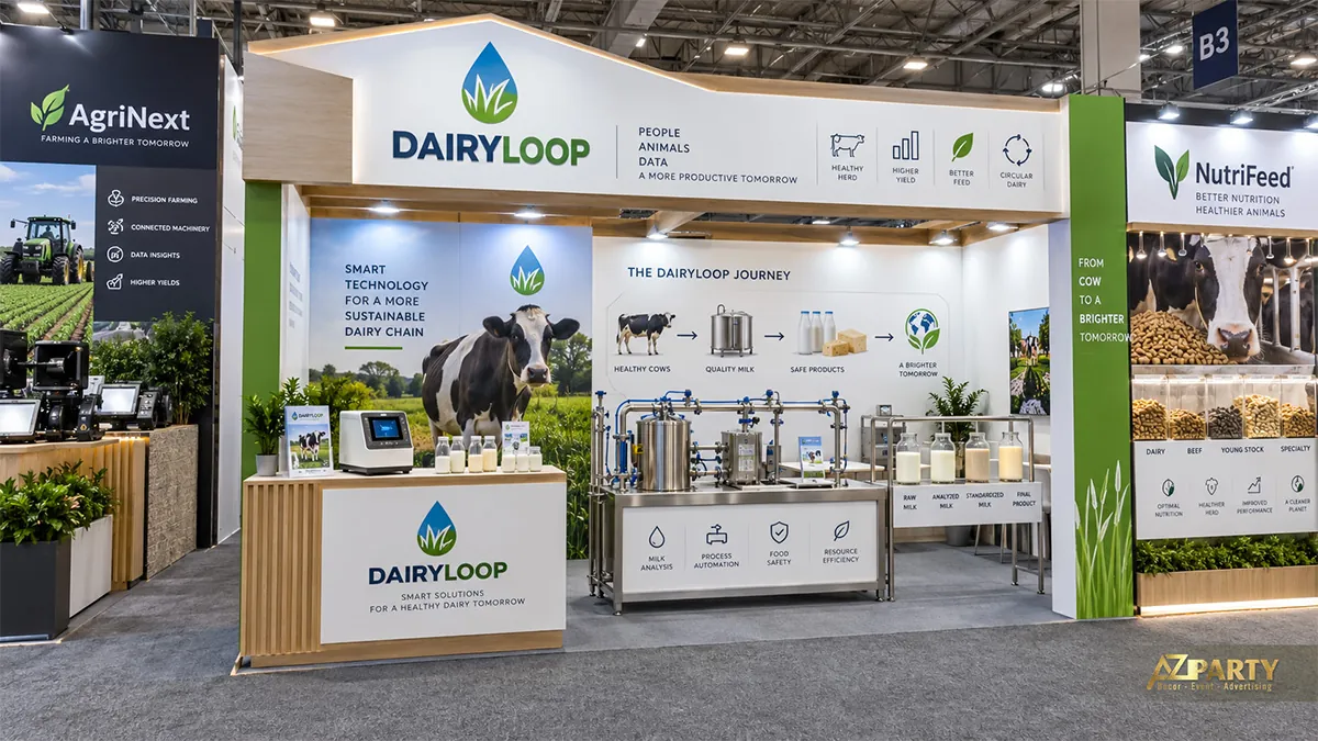 Gian DairyLoop trắng xanh với hệ ống thiết bị sữa và quầy mẫu chai phía trước