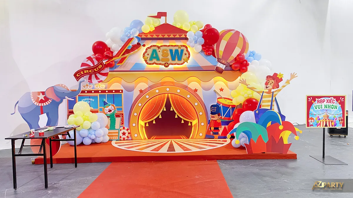 Backdrop rạp xiếc ASW Family Circus Fest 2026 với sân khấu check-in và bảng Rạp xiếc vui nhộn