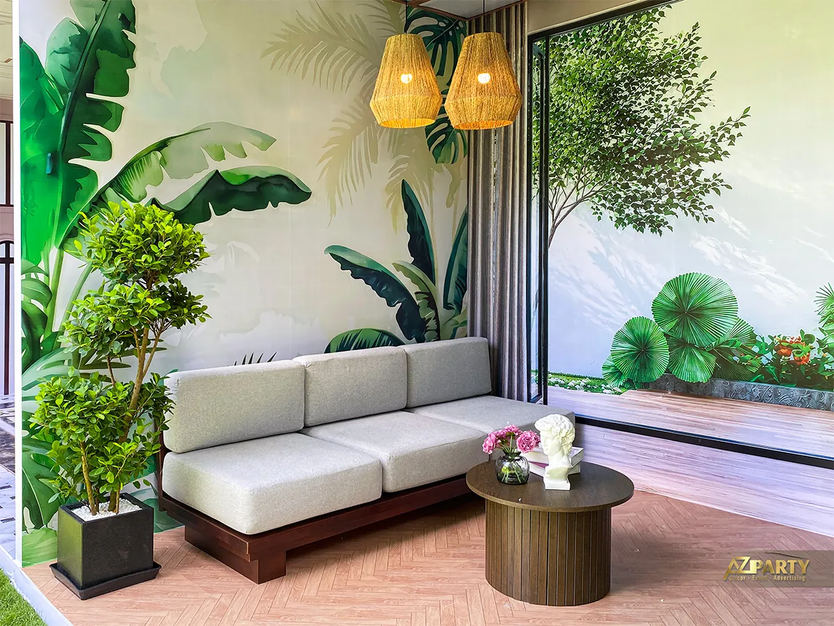 Chi tiết sofa, bàn trà và mảng cây trong không gian giới thiệu Genera