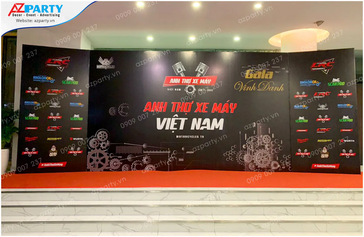 Booth sự kiện Anh Thợ Máy với tone màu đen và đỏ được thiết kế và thi công bởi AZparty