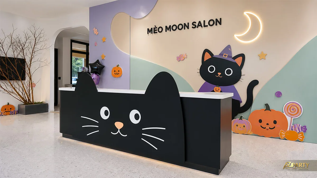 Quầy lễ tân salon Halloween hình mèo đen với trăng sáng, kẹo và bí ngô