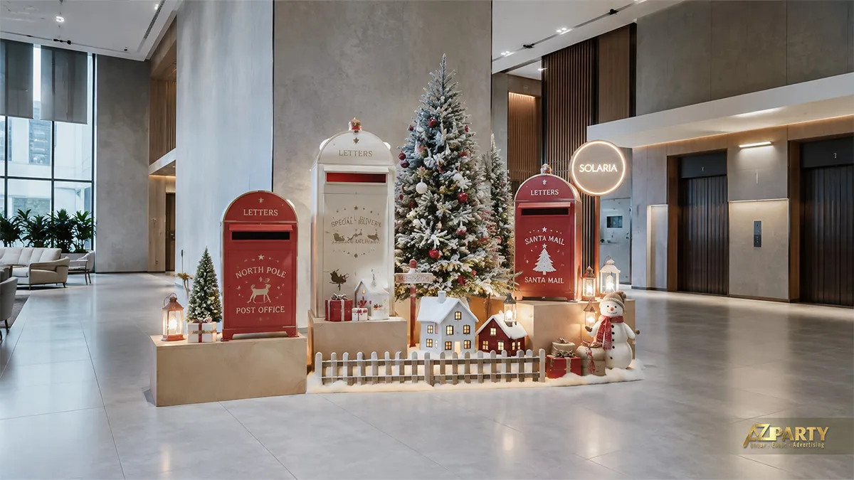 Tiểu cảnh bưu điện Noel với hòm thư đỏ, làng tuyết và cây thông phủ tuyết