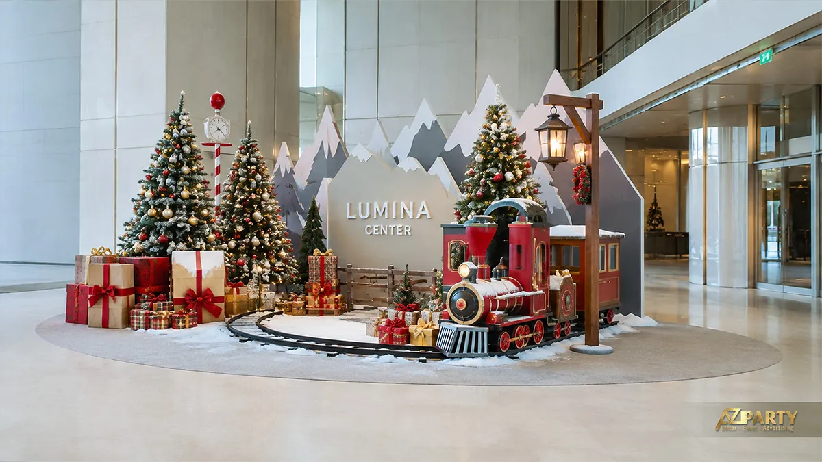 Tiểu cảnh Noel tàu hỏa đỏ chạy quanh rừng thông và núi tuyết