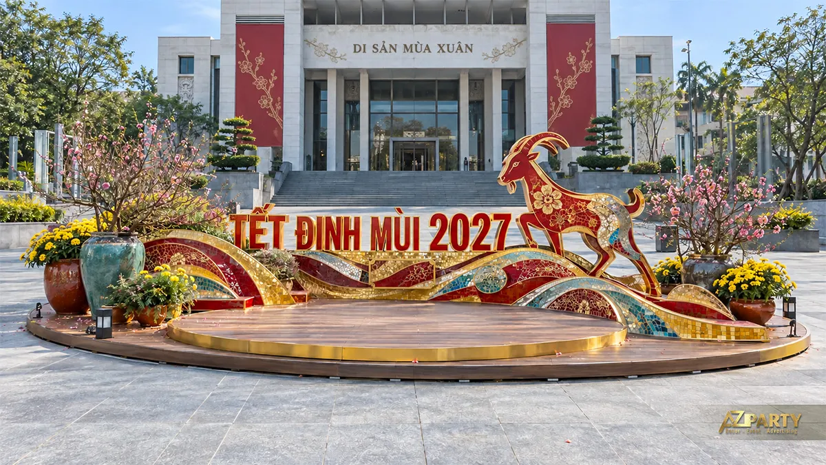 Sân khấu ngoài trời với hình dê chạy trên sóng trang trí nhiều màu