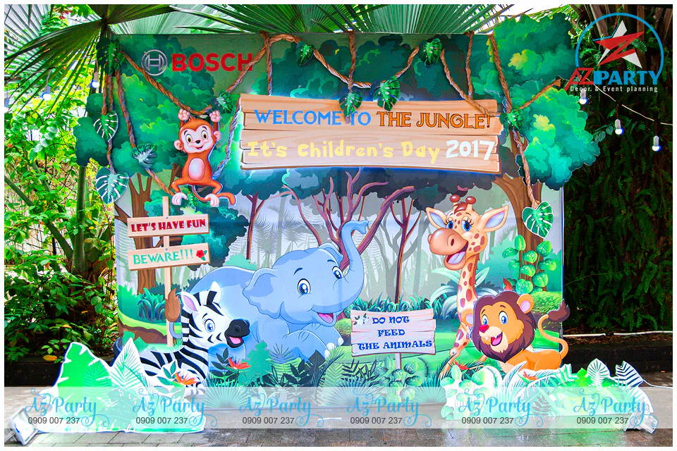 Phông nền photobooth check-in thiết kế 3D nổi khối chủ đề rừng xanh Welcome to the Jungle nhân ngày hội thiếu nhi của công ty Bosch