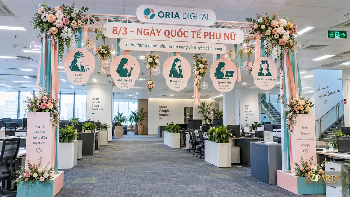 Cổng trong khu làm việc với rèm hồng xanh, hoa treo và bảng nữ kỹ sư, nhà thiết kế