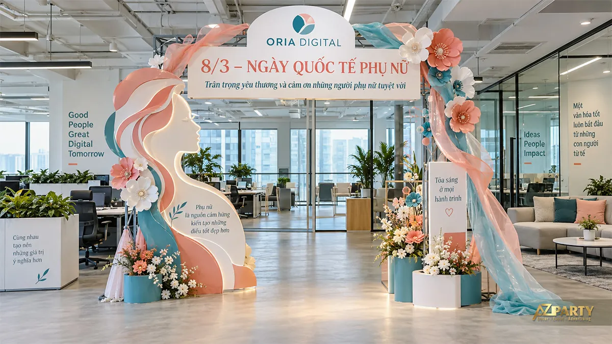 Cổng chào xanh cam tại văn phòng với chân dung phụ nữ, hoa lớn và vải rủ