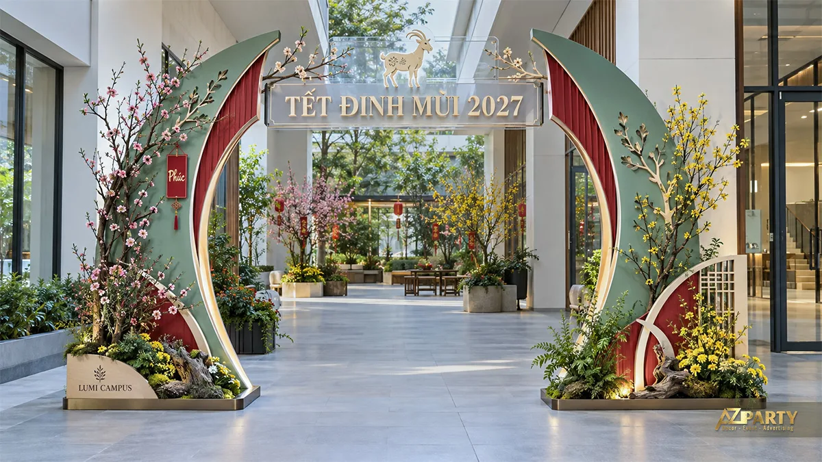 Cổng vòng xanh nhạt với lòng đỏ, hoa đào hồng, hoa mai vàng và hình dê