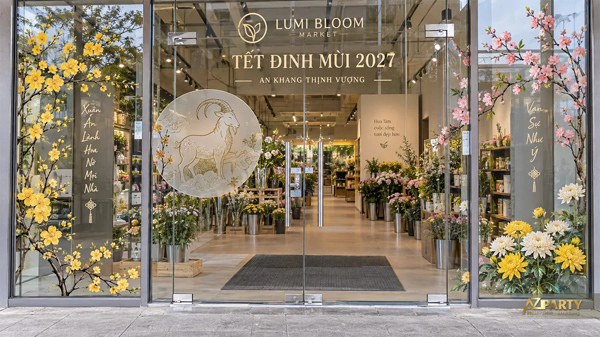 Decal cửa hàng hoa với tranh dê tròn, hoa mai đào và hoa cúc