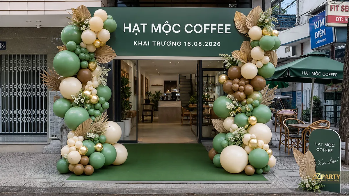 Cổng bóng khai trương Hạt Mộc Coffee màu xanh kem đặt trước cửa hàng