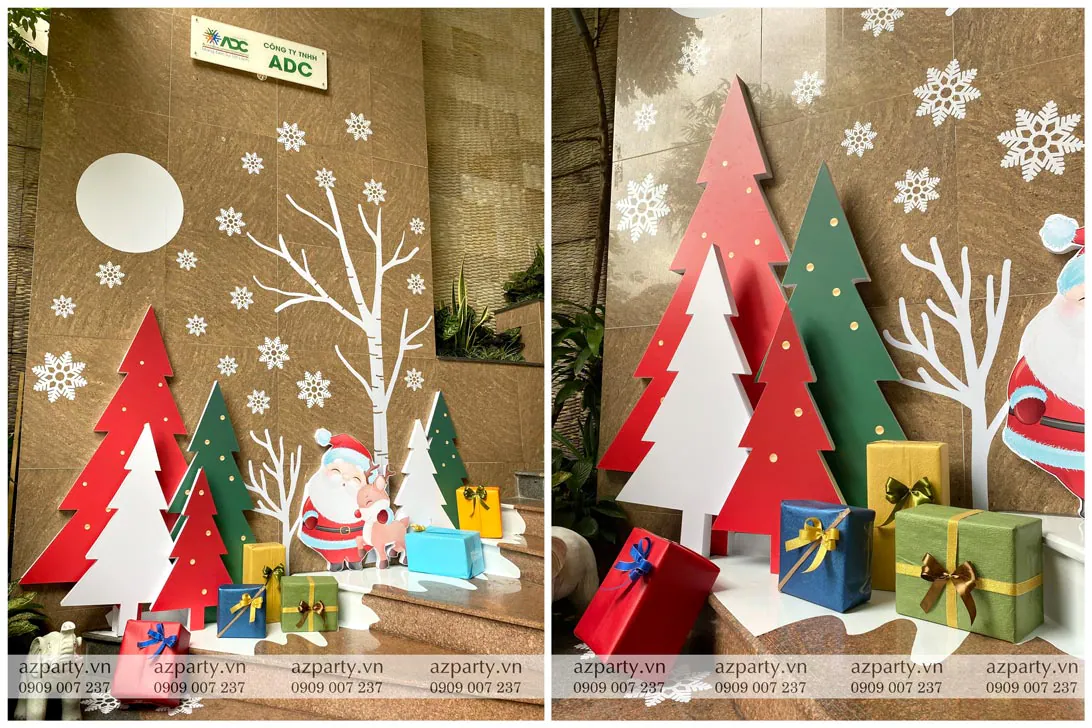Trang trí tiểu cảnh Noel tại chân cầu thang văn phòng ADC với mô hình cây thông nhiều màu, ông già Noel và các hộp quà xinh xắn.