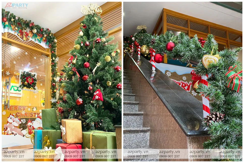 Cây thông Noel lớn cao 2m được trang trí quả châu rực rỡ bên cạnh lan can cầu thang quấn dây thông xanh đón Giáng sinh tại công ty ADC.