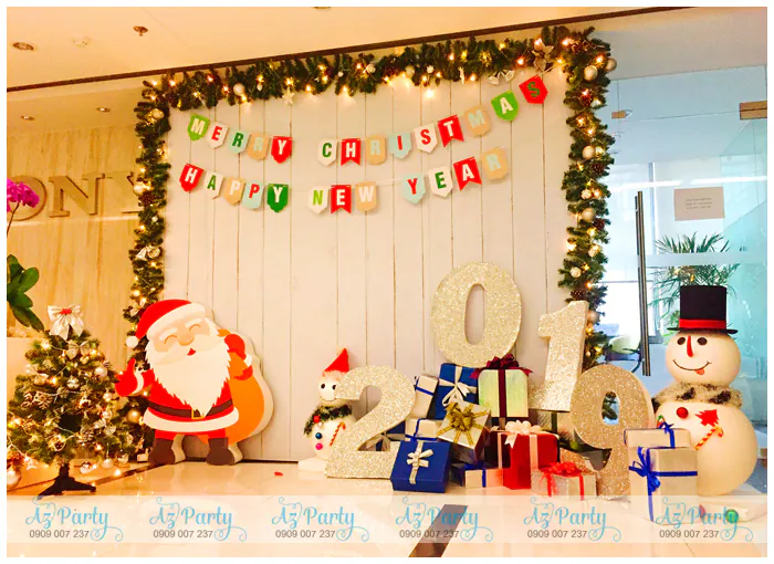 Backdrop Noel và chúc mừng năm mới 2019 tại văn phòng công ty Sony với chữ số 2019 lấp lánh, ông già Noel và người tuyết dễ thương.