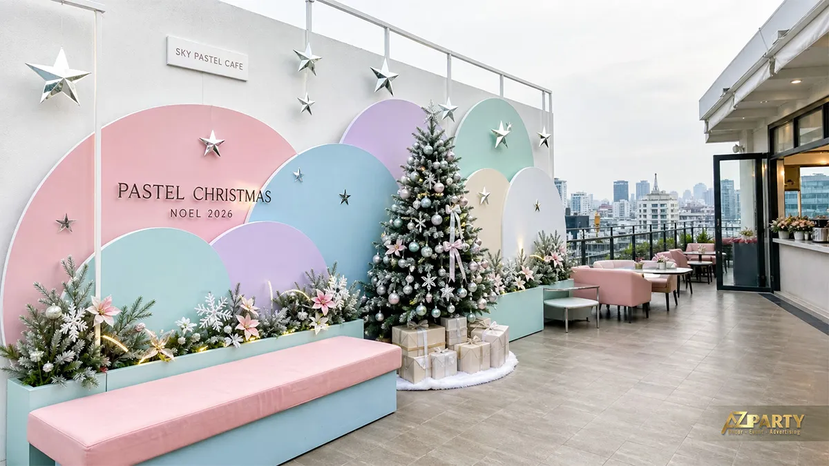 Rooftop Sky Pastel Cafe với các vòng pastel, cây thông trung tâm, ghế và thành phố phía xa