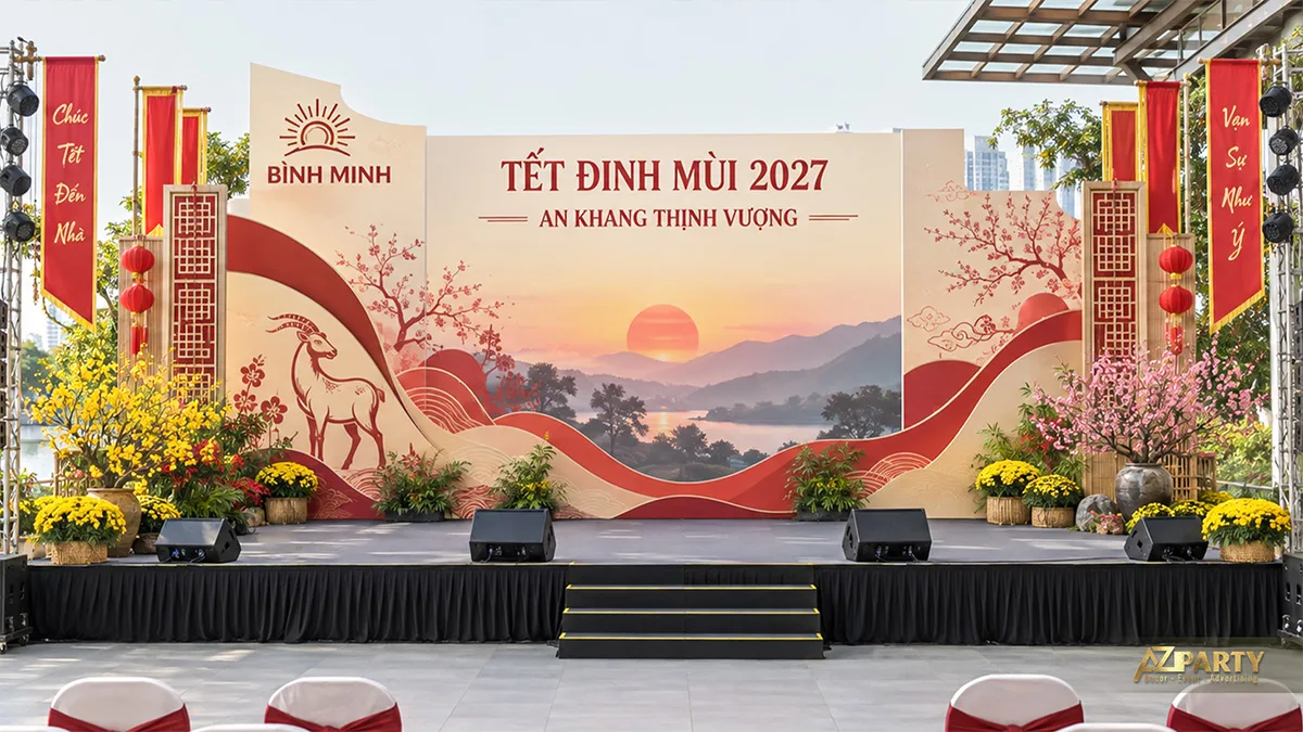 Sân khấu ngoài trời với nền kem đỏ, đèn lồng và tranh bình minh