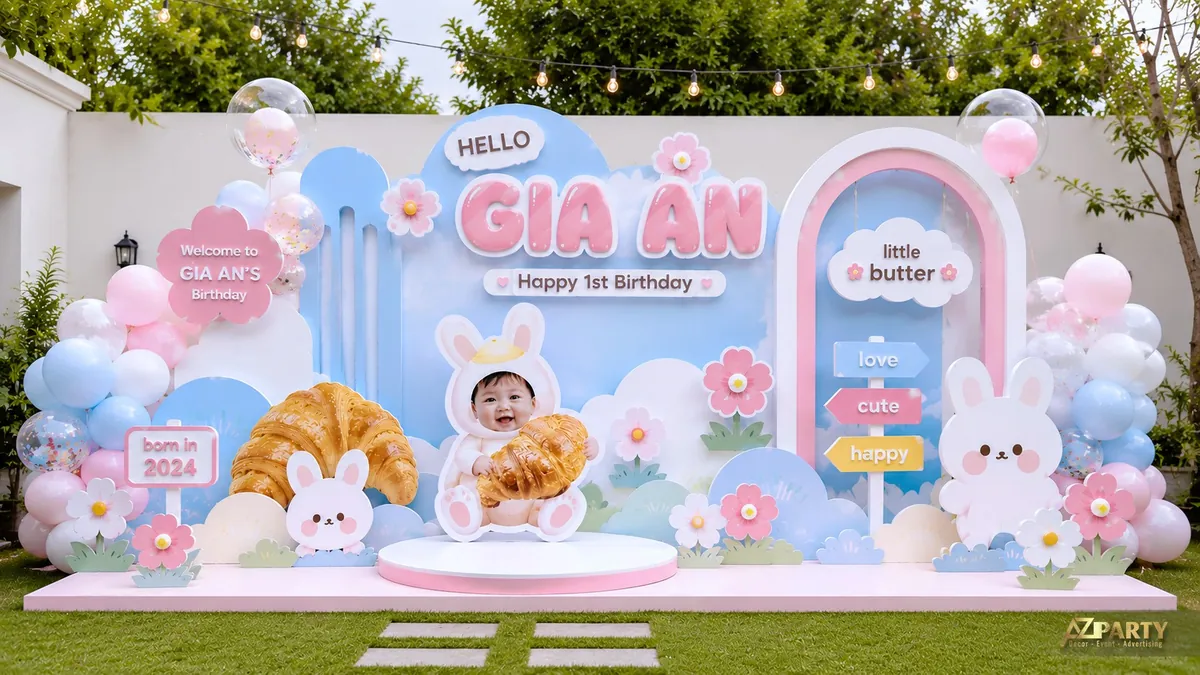 Trang trí sinh nhật bé Gia An với bóng pastel hồng xanh, thỏ trắng và hoa cúc