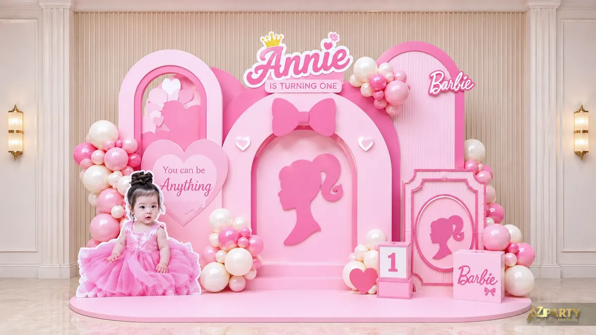 Sân khấu sinh nhật Barbie bé Annie với bóng hồng trắng, nơ lớn và biểu tượng mái tóc