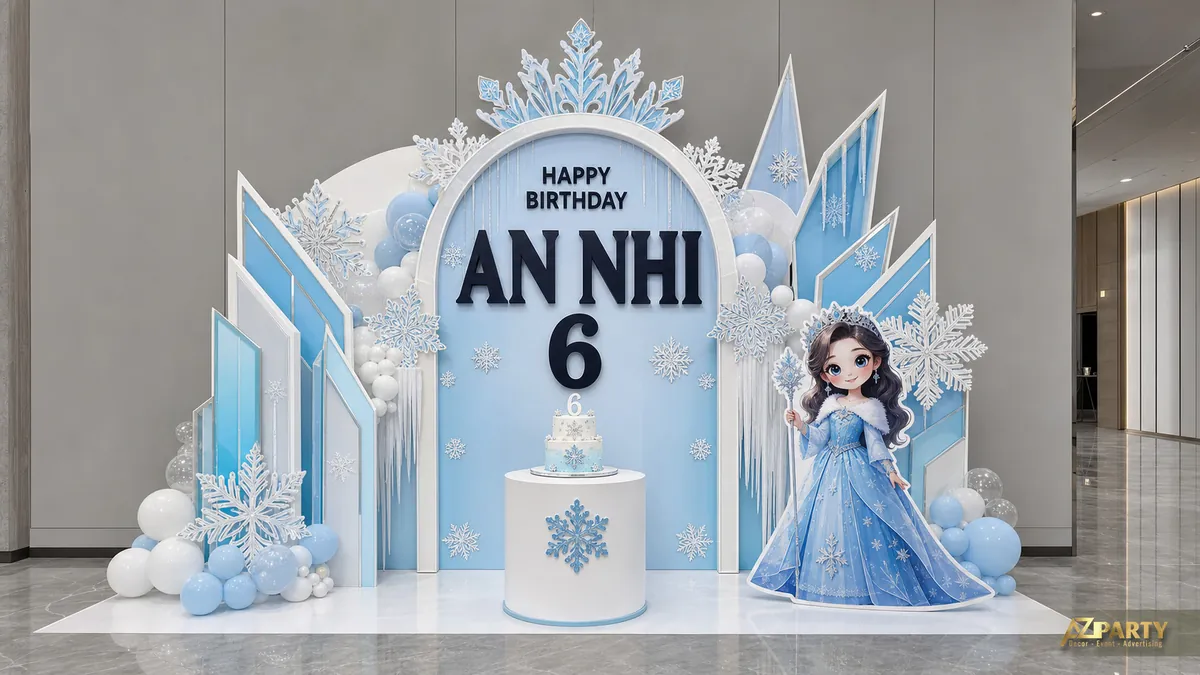 Backdrop Elsa cho bé An Nhi 6 tuổi với các cột băng, bông tuyết và nền xanh trắng