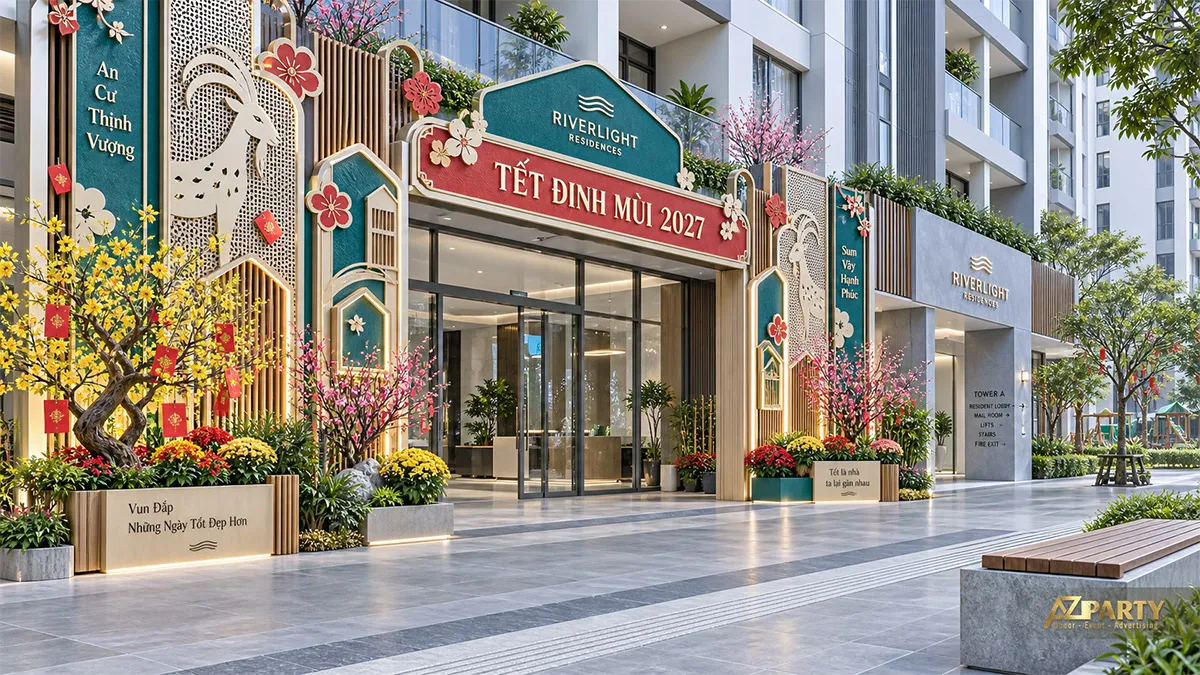 Cổng sảnh chung cư trang trí khung Tết xanh ngọc, dê và hoa mai đào