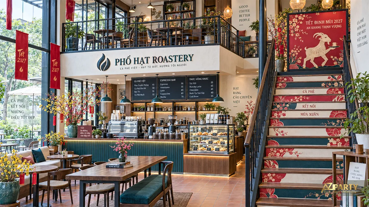 Cầu thang Phố Hạt Roastery trang trí decal đỏ và tranh linh vật Tết Đinh Mùi