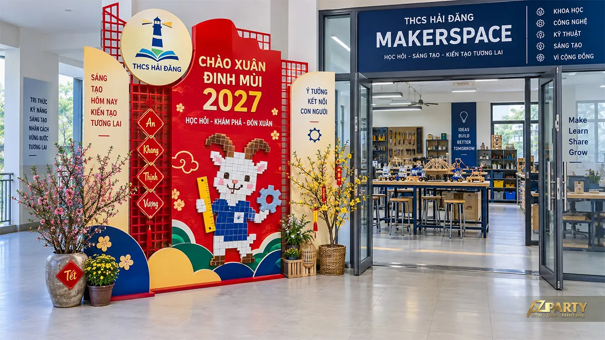 Cổng phòng sáng tạo Makerspace với linh vật dê, bánh răng và thước kẻ