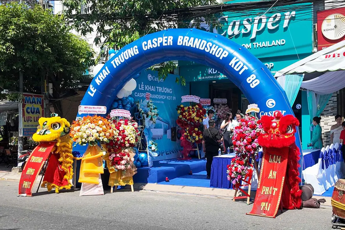 cổng chào hơi, lân sư rồng và hoa khait trương
