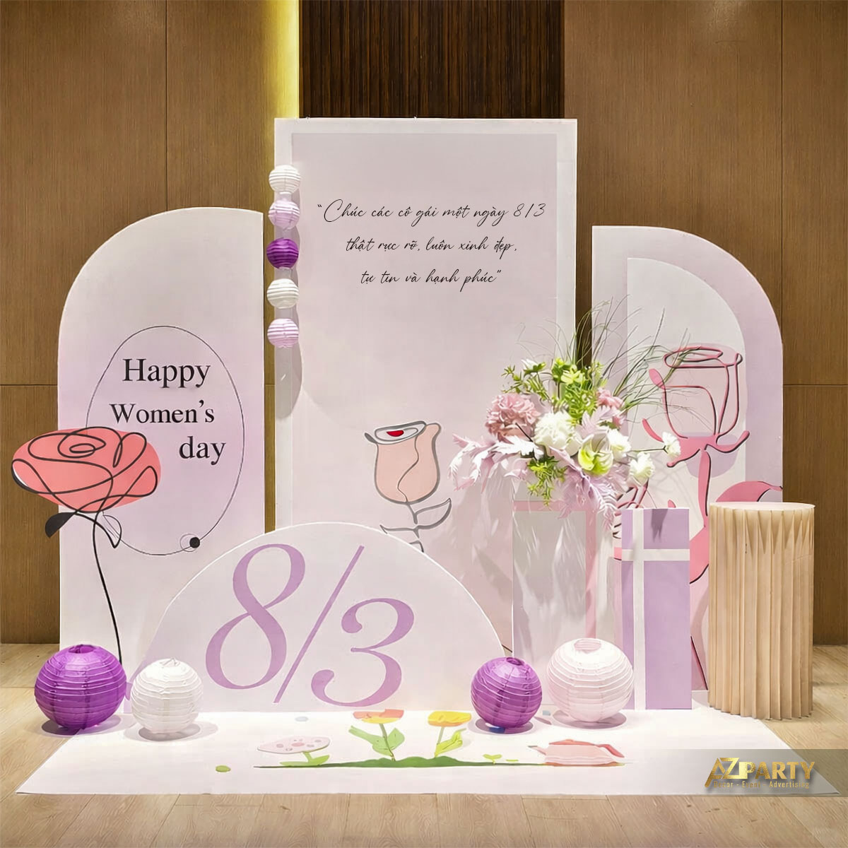 Backdrop trang trí 8/3 tông hồng pastel, số 8/3 nổi bật, hoa tươi và lời chúc yêu thương