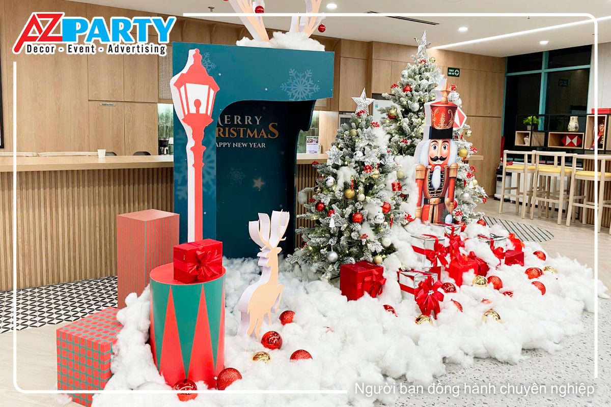 Góc bên trái của tiêu cảnh noel, nổi bật là hình ảnh cột đèn và hộp giftbox khổng lồ